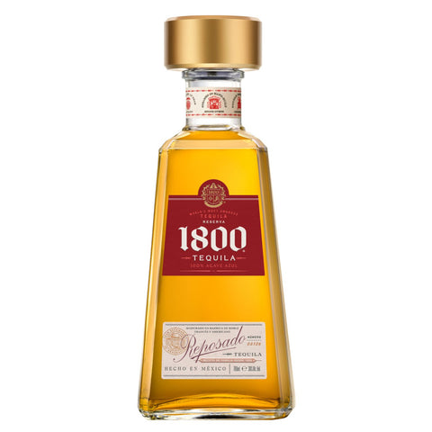 1800 Tequila bottle with gold cap on a white background
