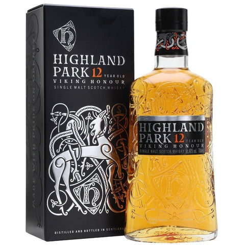 Highland Park 12-year-old whisky bottle and packaging on a white background